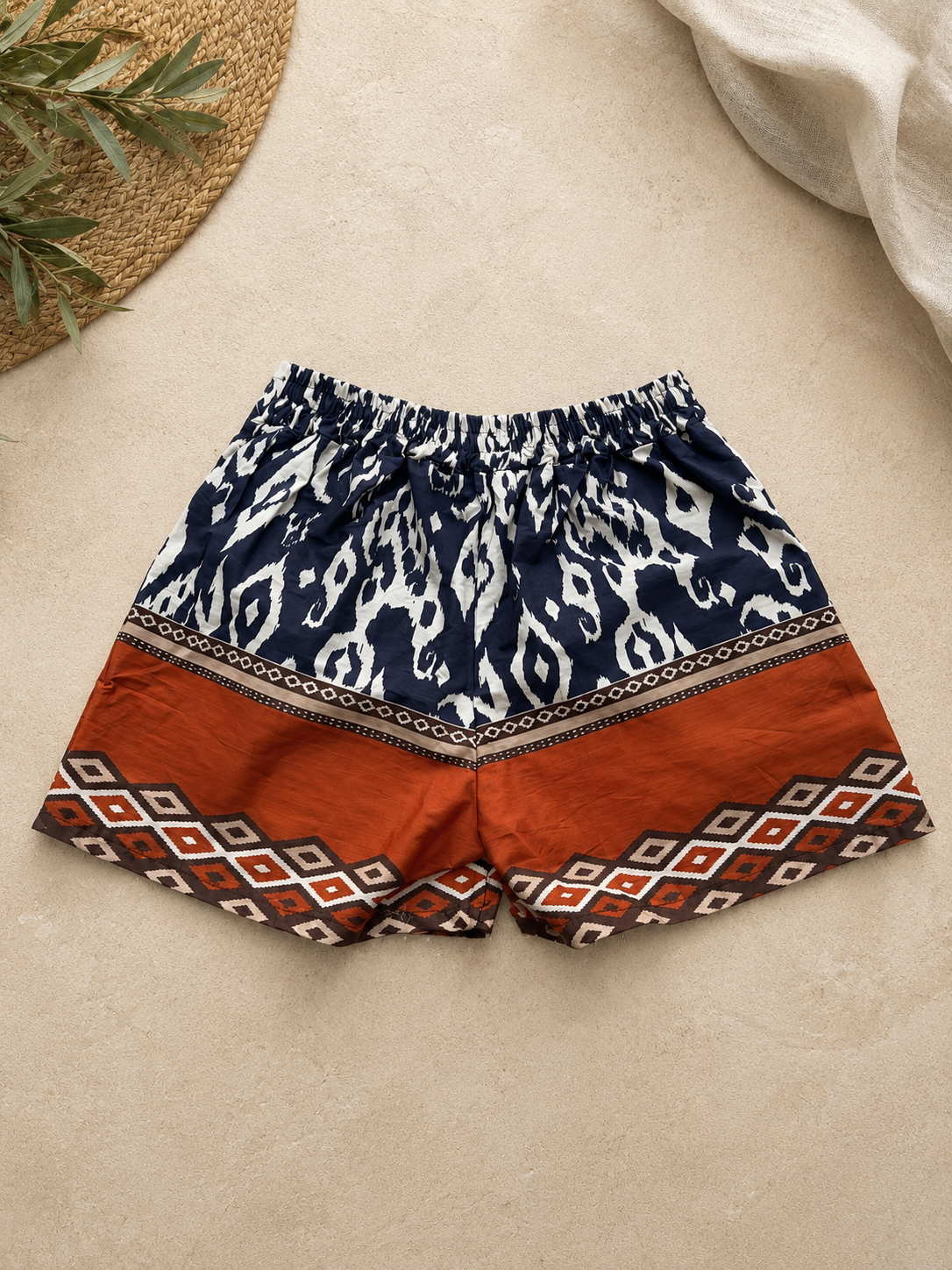 Shorts fantasia blu e tabacco