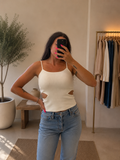 Top a coste con cut out laterali