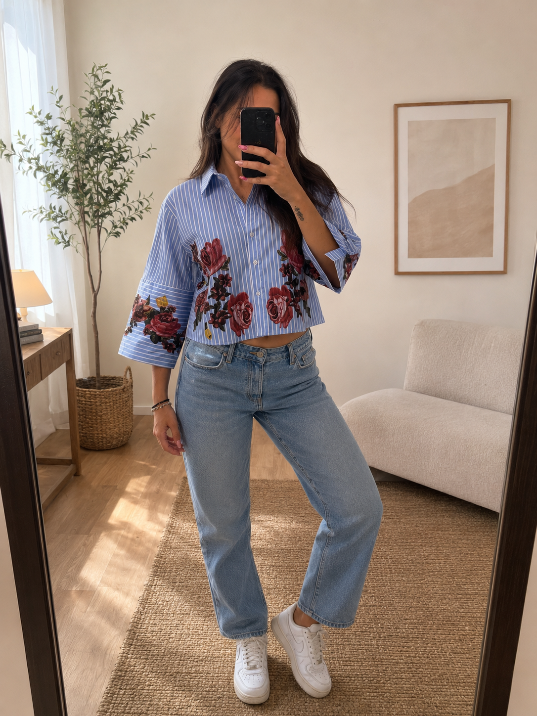 Camicia a righe azzurre stampa floreale