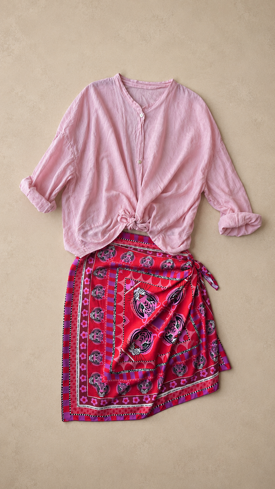 Gonna pareo con nodo laterale rosa