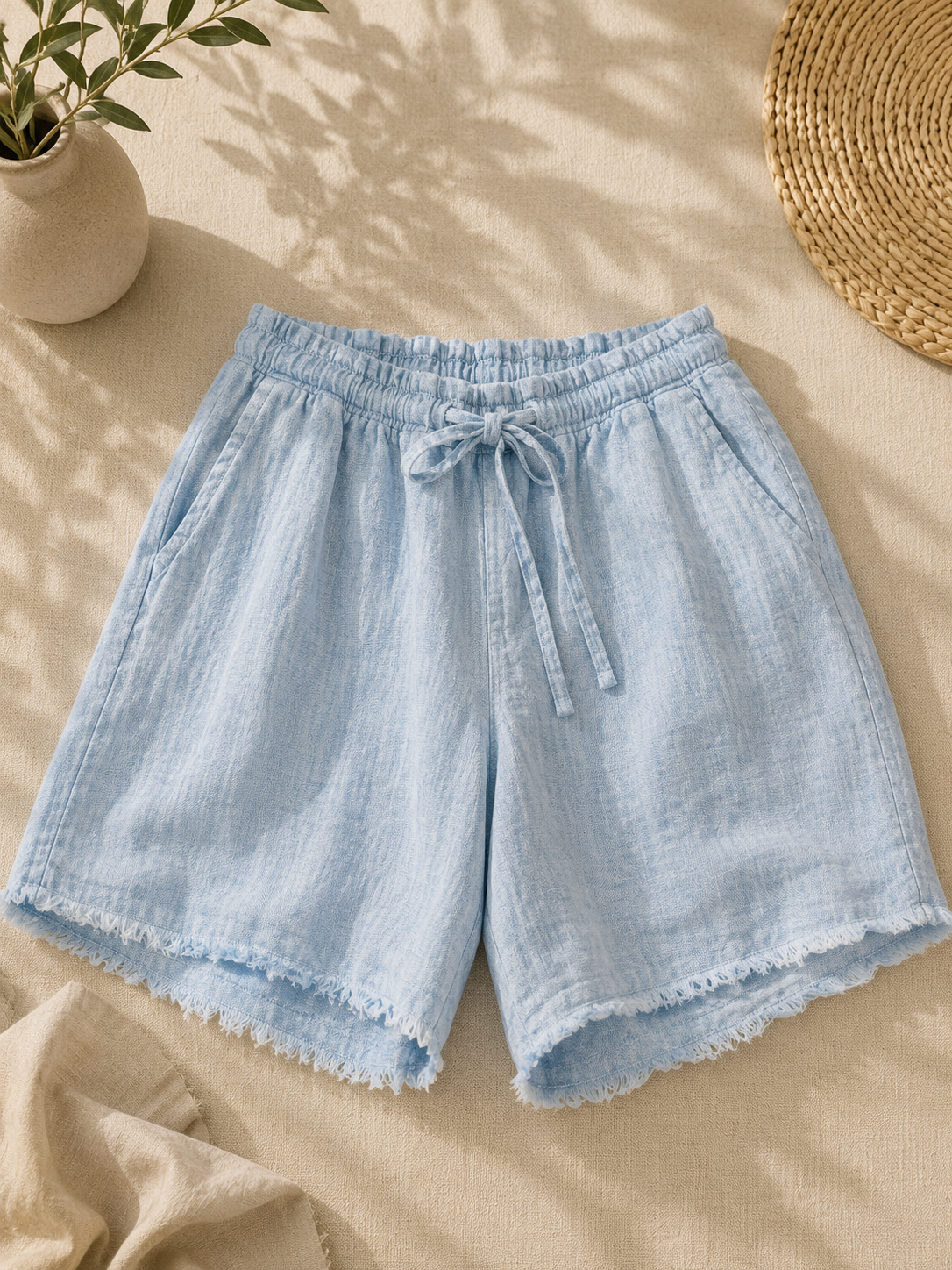 Shorts lino sfrangiato