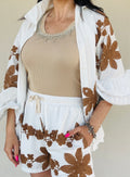 Shorts con ricamo